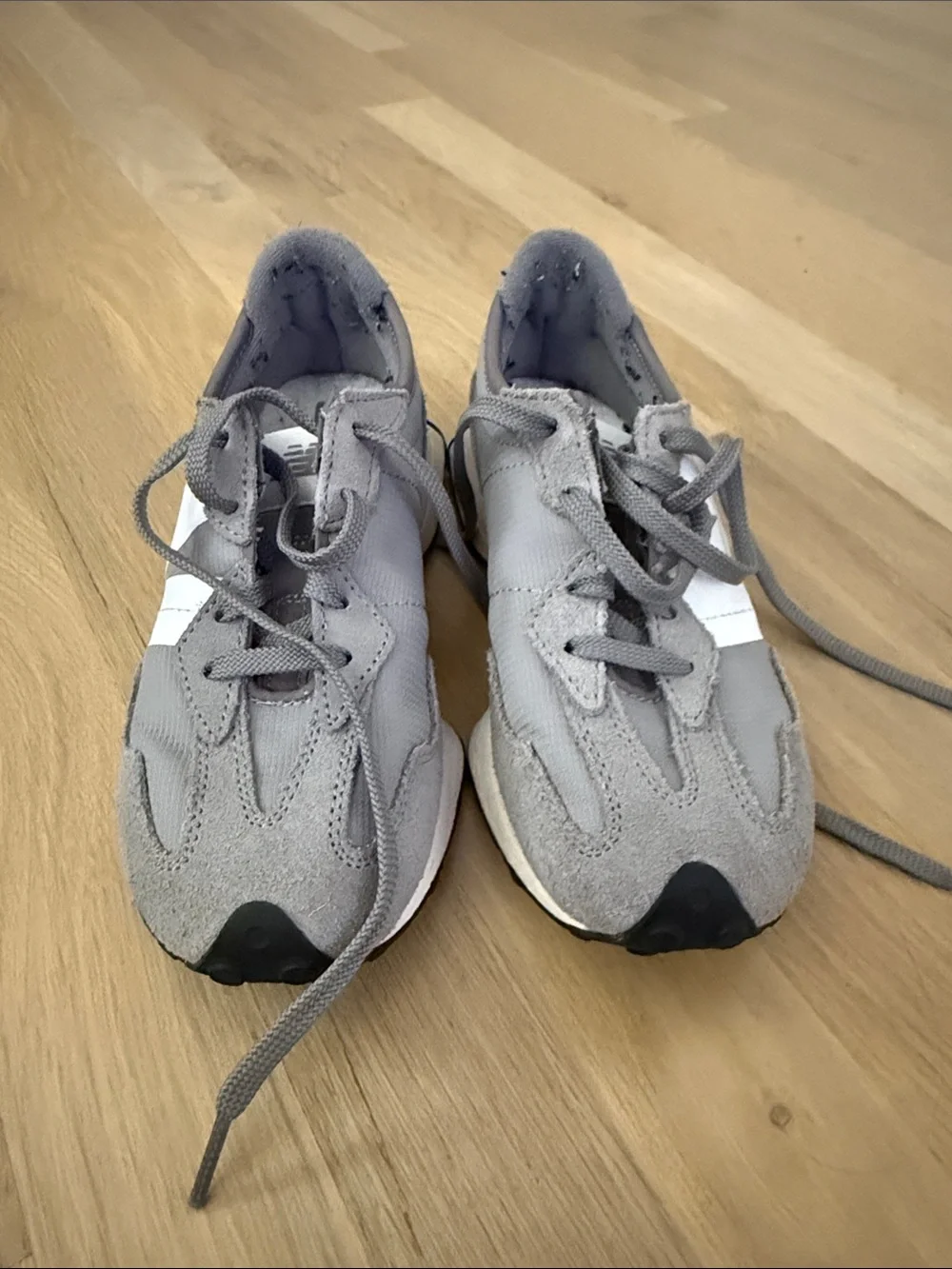 New Balance Kids Gray and White Sneakers